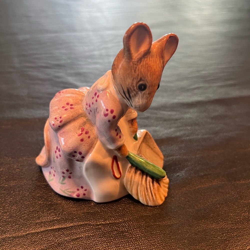 Beatrix Potter’s “Hunca Munca Sweeping”